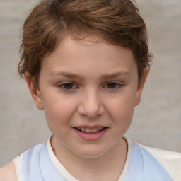 Joyful white child female with short  brown hair and brown eyes