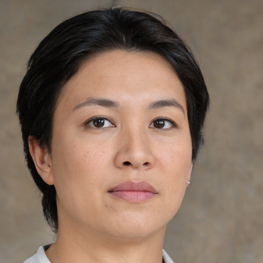 Neutral asian young-adult female with short  brown hair and brown eyes