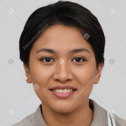 Joyful asian young-adult female with short  brown hair and brown eyes