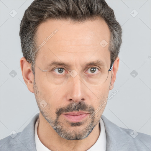 Neutral white adult male with short  brown hair and brown eyes