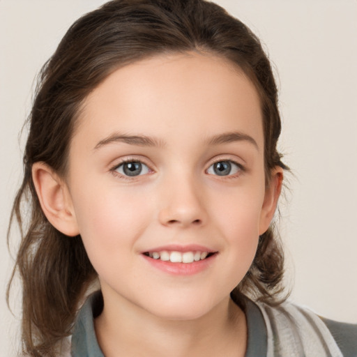 Joyful white child female with medium  brown hair and brown eyes