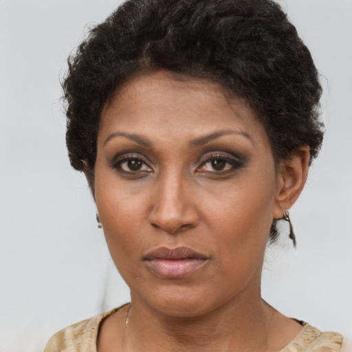 Neutral black young-adult female with short  brown hair and brown eyes