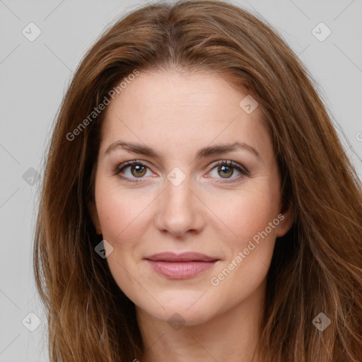 Joyful white young-adult female with long  brown hair and green eyes