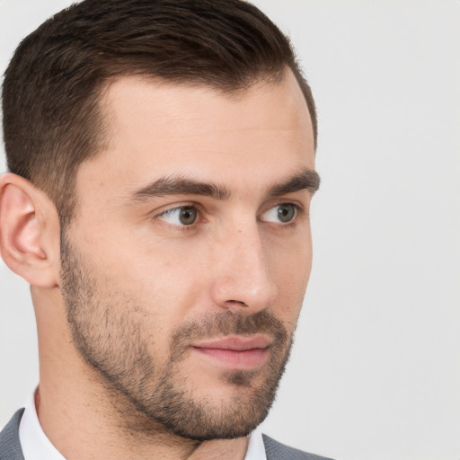 Neutral white young-adult male with short  brown hair and brown eyes