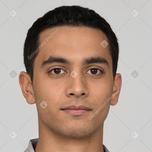 Neutral latino young-adult male with short  black hair and brown eyes