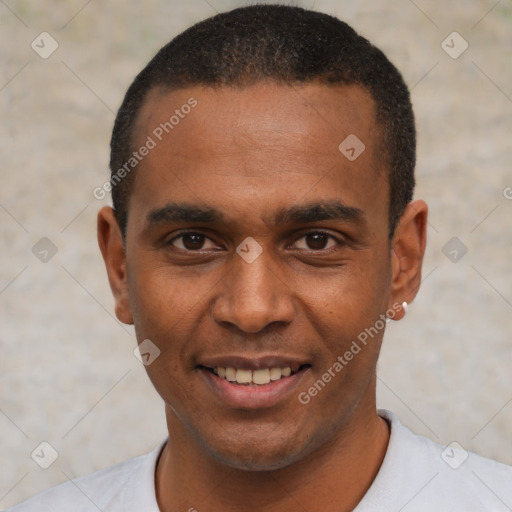 Joyful black young-adult male with short  black hair and brown eyes