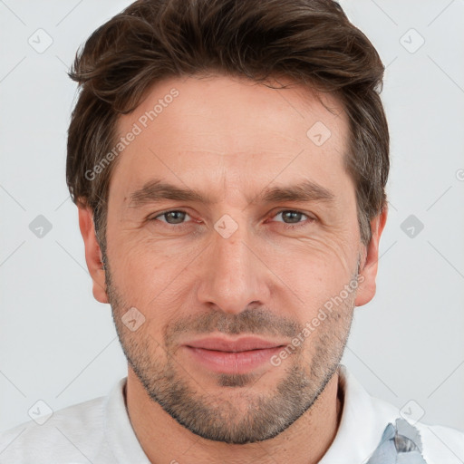 Joyful white adult male with short  brown hair and grey eyes