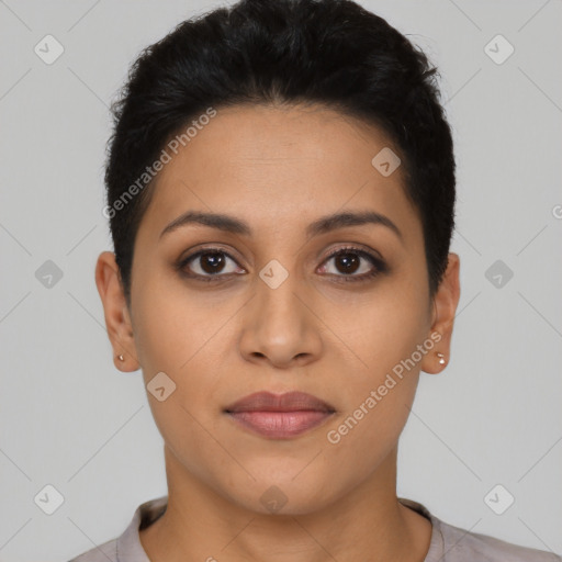 Joyful latino young-adult female with short  brown hair and brown eyes