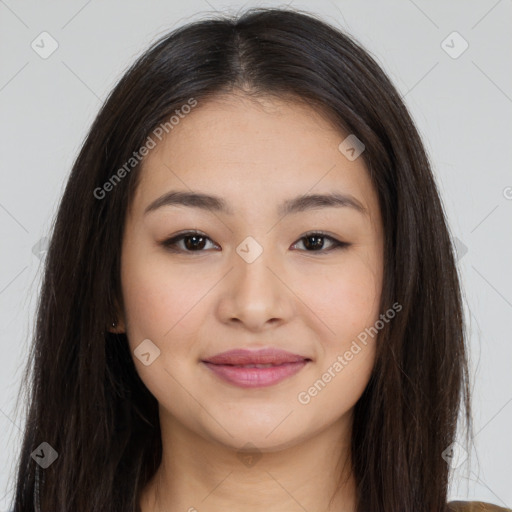 Joyful asian young-adult female with long  brown hair and brown eyes