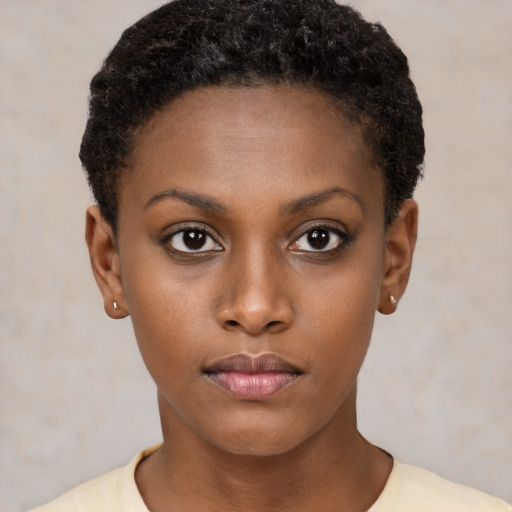 Neutral black young-adult female with short  brown hair and brown eyes