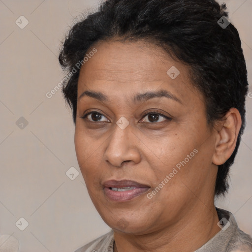 Joyful latino adult female with short  brown hair and brown eyes