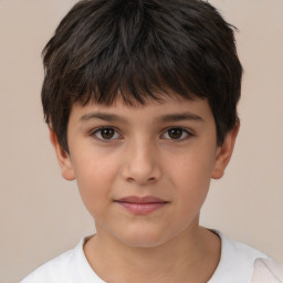 Joyful white child male with short  brown hair and brown eyes