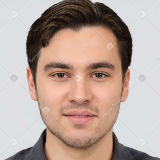 Joyful white young-adult male with short  brown hair and brown eyes