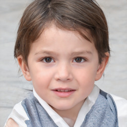 Joyful white child female with short  brown hair and blue eyes