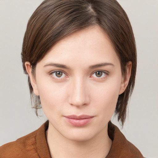 Neutral white young-adult female with medium  brown hair and brown eyes