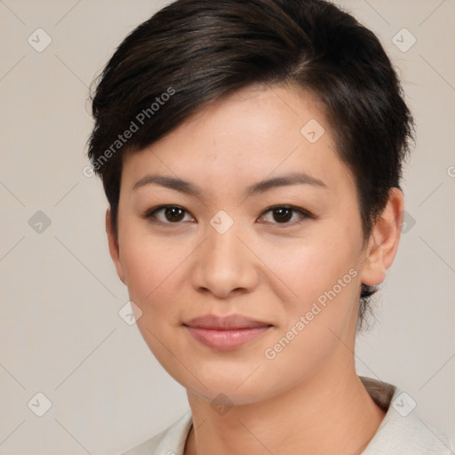 Joyful asian young-adult female with short  brown hair and brown eyes