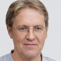 Joyful white middle-aged male with short  brown hair and grey eyes