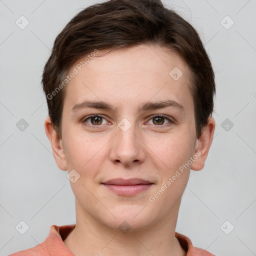 Joyful white young-adult female with short  brown hair and grey eyes