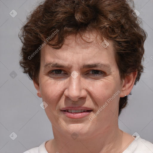 Joyful white adult female with short  brown hair and brown eyes