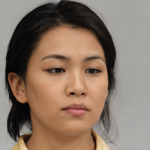 Neutral asian young-adult female with medium  brown hair and brown eyes
