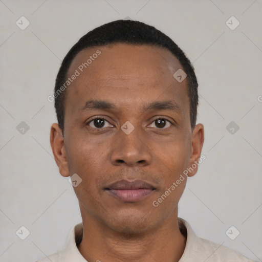 Neutral black young-adult male with short  black hair and brown eyes