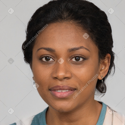 Joyful black young-adult female with long  brown hair and brown eyes