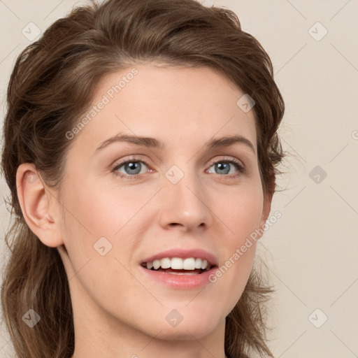 Joyful white young-adult female with medium  brown hair and green eyes