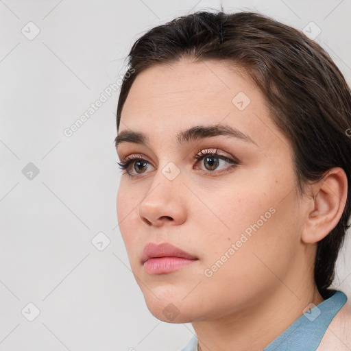 Neutral white young-adult female with medium  brown hair and brown eyes