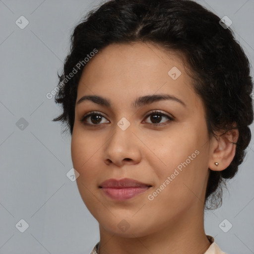 Joyful latino young-adult female with medium  black hair and brown eyes