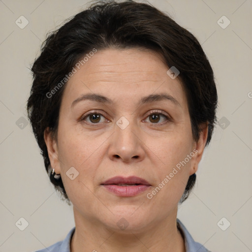 Joyful white adult female with short  brown hair and brown eyes