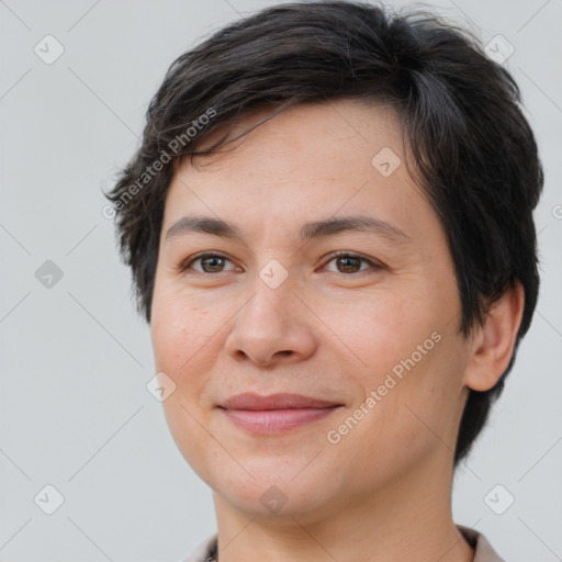 Joyful white adult female with short  brown hair and brown eyes