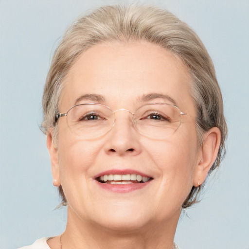 Joyful white middle-aged female with medium  brown hair and brown eyes