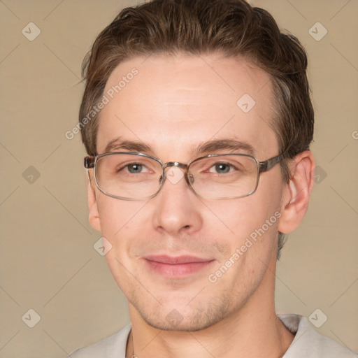 Joyful white adult male with short  brown hair and grey eyes