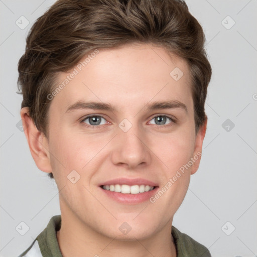 Joyful white young-adult male with short  brown hair and grey eyes