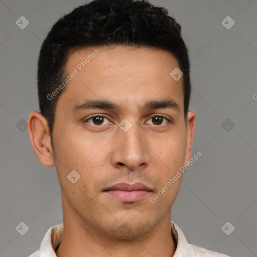 Neutral latino young-adult male with short  brown hair and brown eyes