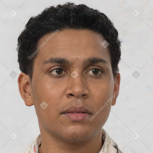 Neutral latino young-adult male with short  brown hair and brown eyes