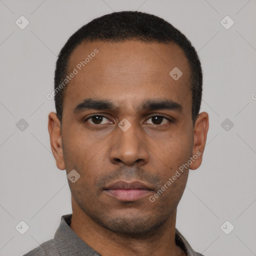 Neutral latino young-adult male with short  black hair and brown eyes