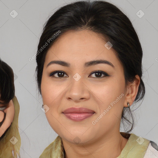 Joyful asian young-adult female with medium  brown hair and brown eyes