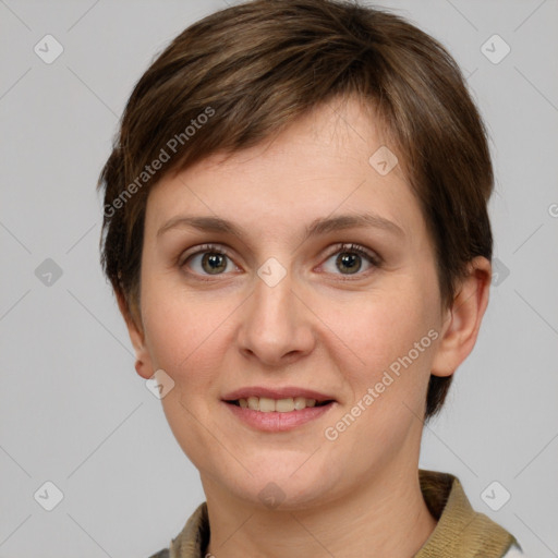 Joyful white young-adult female with short  brown hair and grey eyes