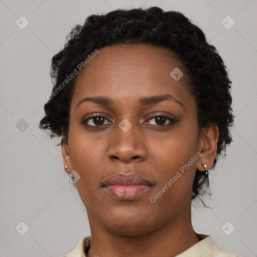 Neutral black young-adult female with short  black hair and brown eyes