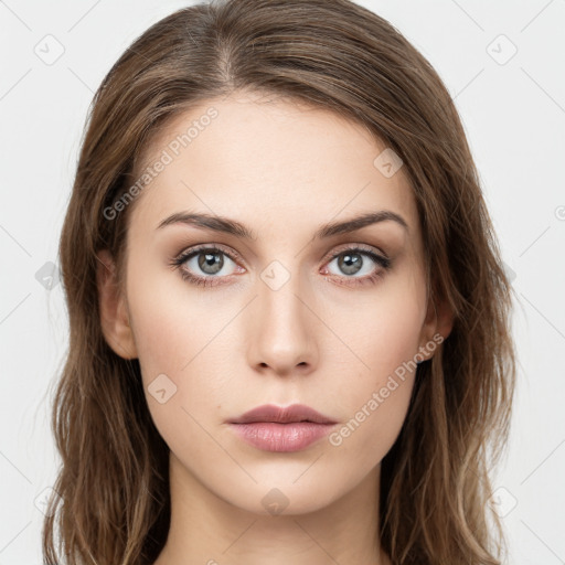 Neutral white young-adult female with long  brown hair and green eyes