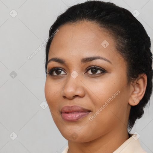 Joyful latino young-adult female with short  black hair and brown eyes