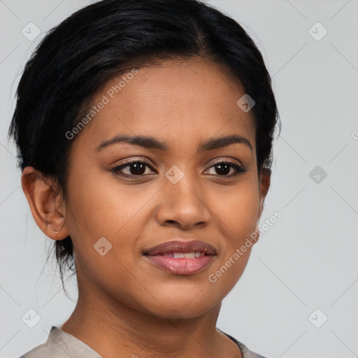 Joyful latino young-adult female with short  brown hair and brown eyes