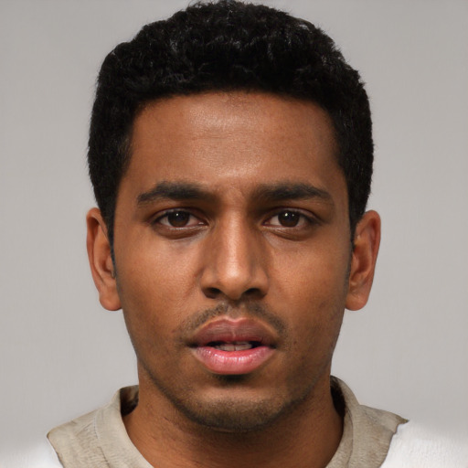 Neutral black young-adult male with short  black hair and brown eyes