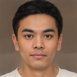 Neutral asian young-adult male with short  black hair and brown eyes