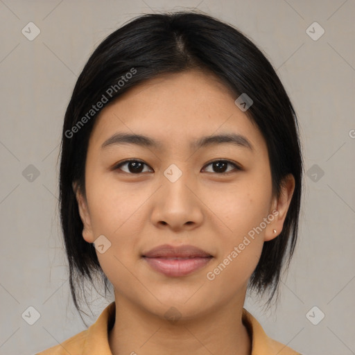 Joyful asian young-adult female with medium  black hair and brown eyes