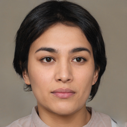 Neutral latino young-adult female with medium  brown hair and brown eyes
