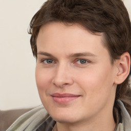 Joyful white young-adult male with medium  brown hair and brown eyes