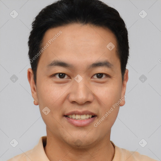 Joyful latino young-adult male with short  brown hair and brown eyes