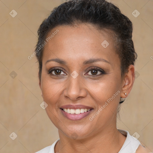 Joyful white adult female with short  brown hair and brown eyes